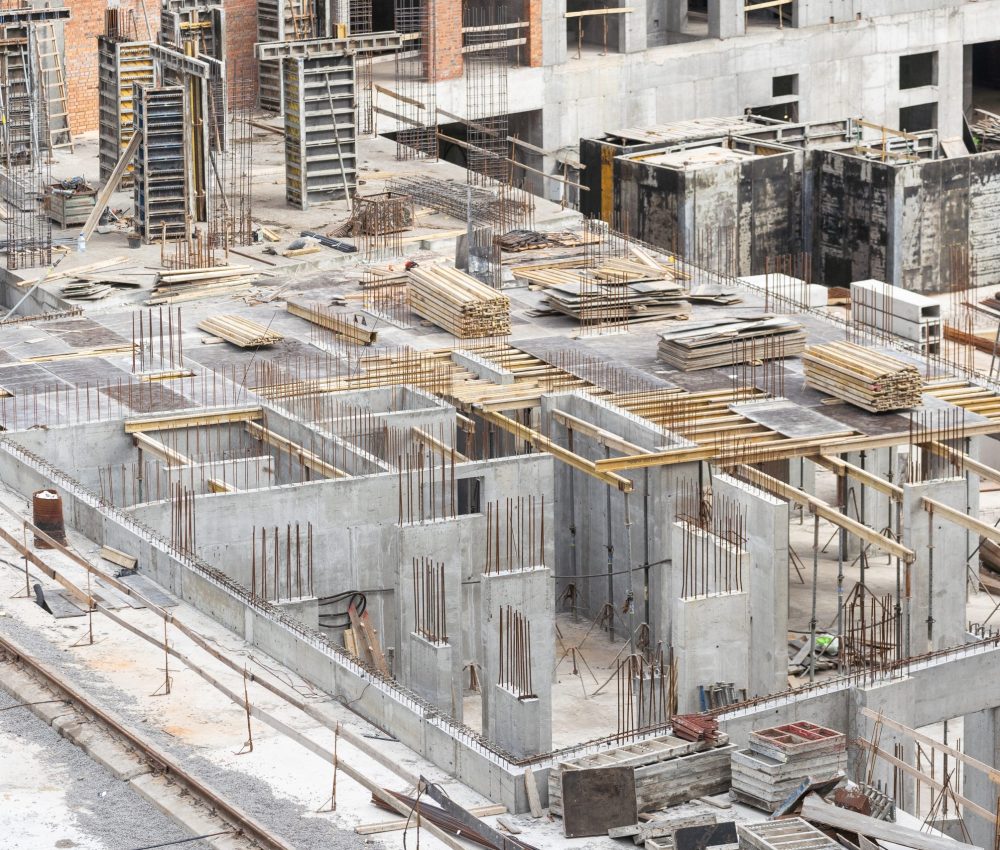 Construction of apartment buildings, dense urban development. The process of construction of residential buildings. High quality photo